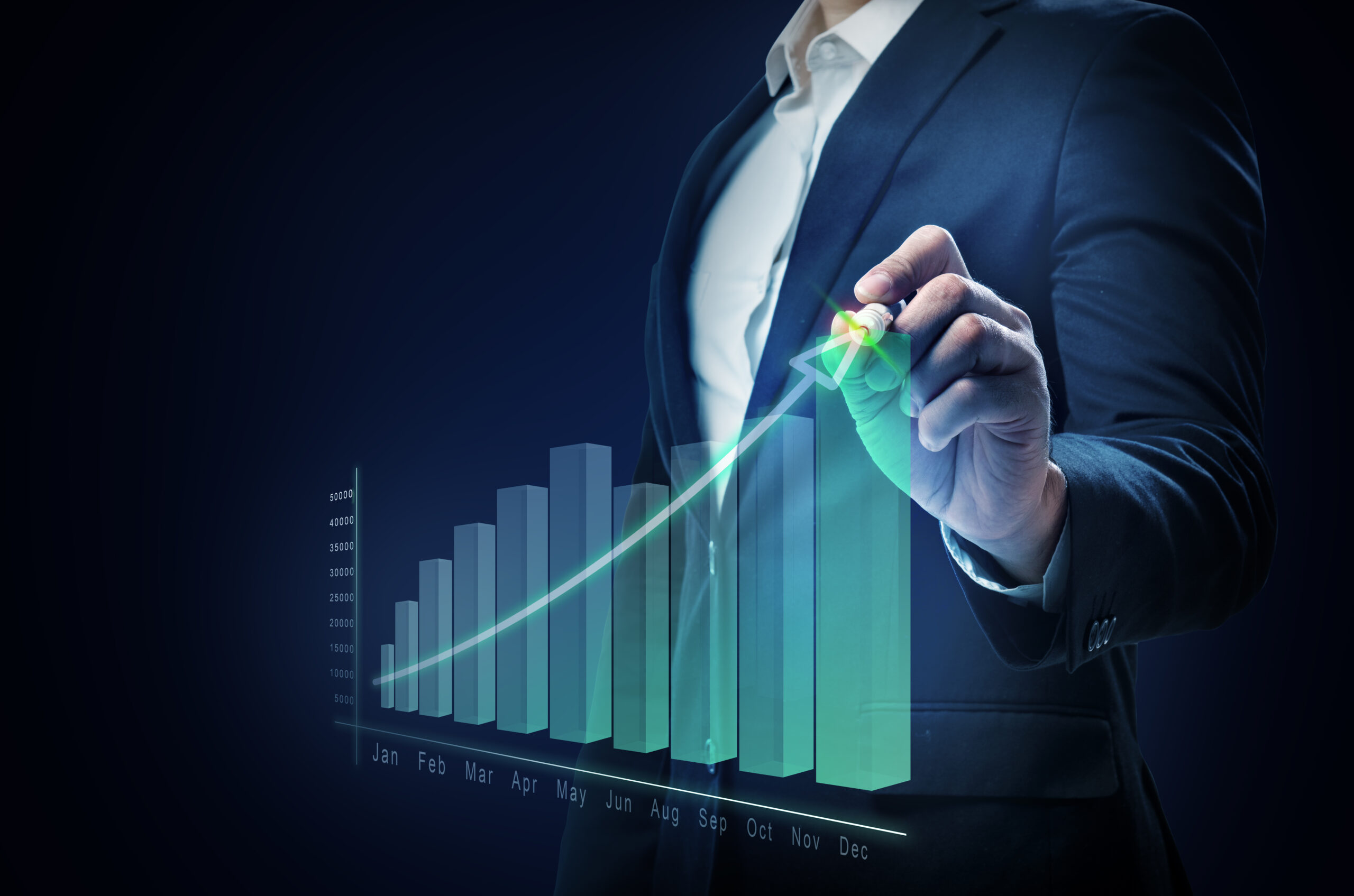 Businessman drawing a increases graph on virtual screen